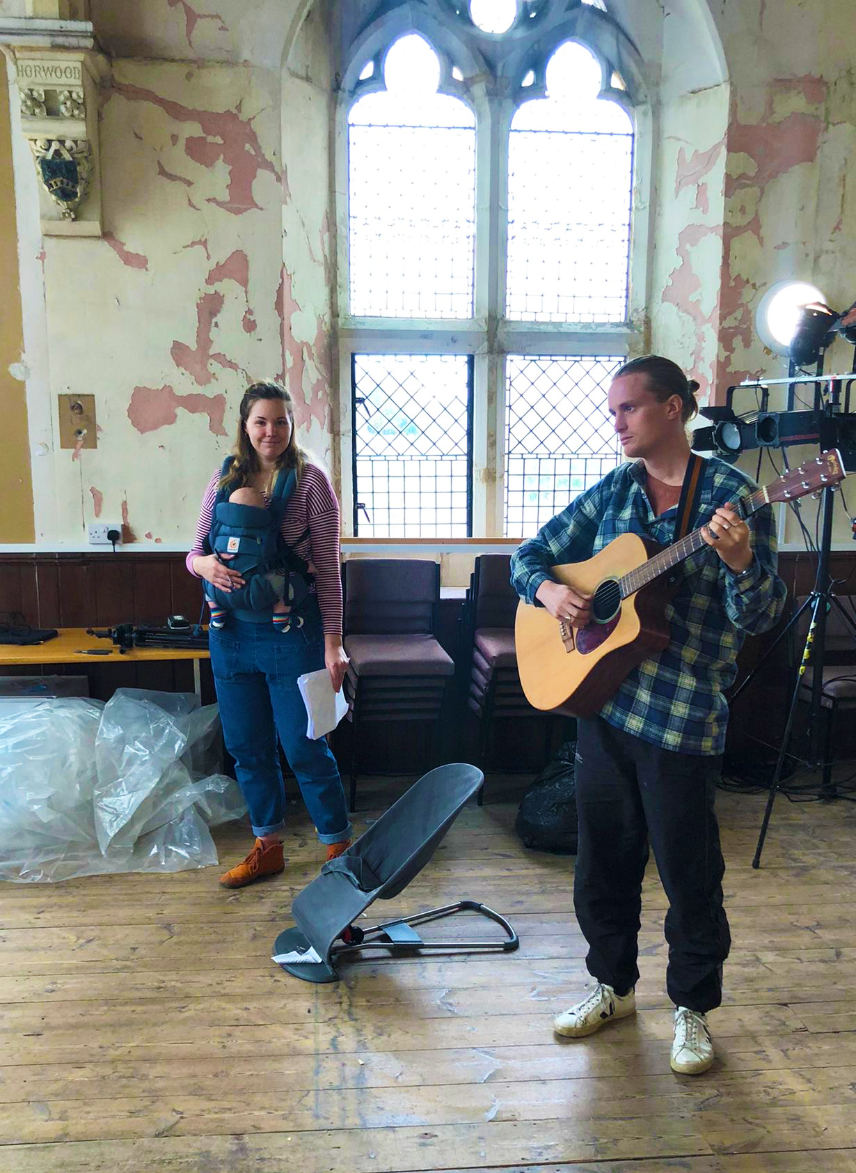 Pete with guitar Poppy with baby